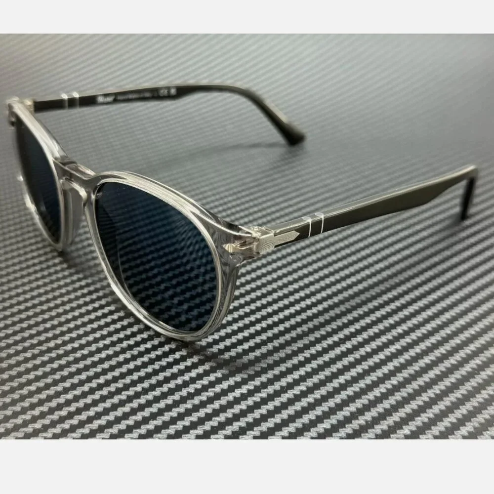 Persol Clear Frame Sunglasses with Black Temples and Dark Blue Lenses